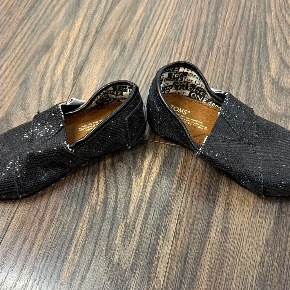 TOMS Kids Glittery Black Moccasins